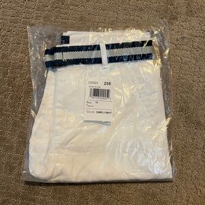 White Shorts with Blue and White Striped Belt